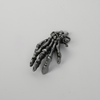 Skull hand belt buckle