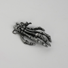 Skull hand belt buckle