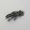 Skull hand belt buckle