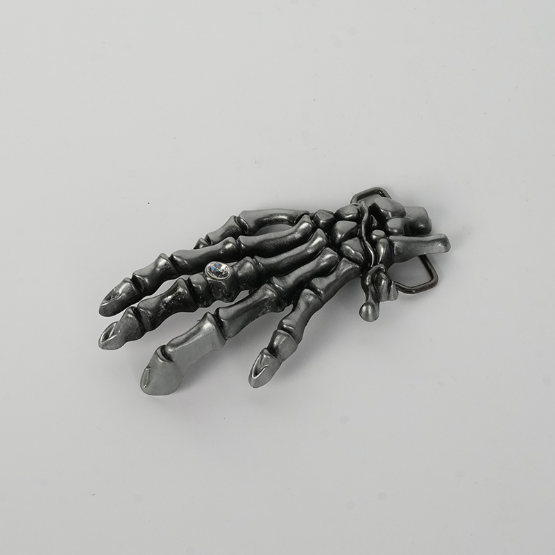 Skull hand belt buckle