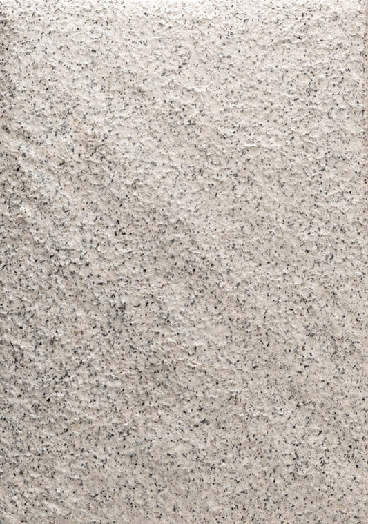 Gray and white fiber-textured handmade paper with natural flecked surface