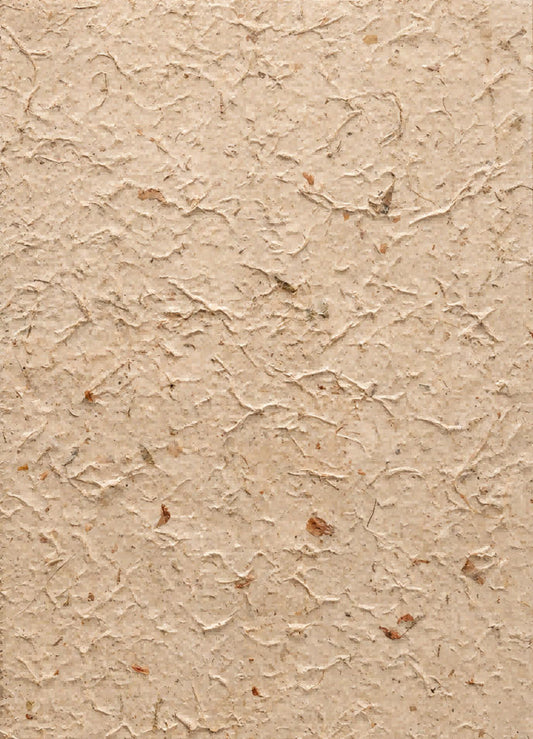 Vintage handmade botanical paper with mixed pressed roses, rose petals and a naturally textured surface
